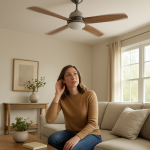 Ceiling fan gently wobbling above modern living room, homeowner listening up